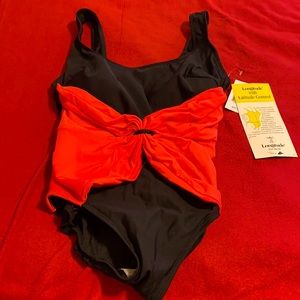 Longitude slimming swimsuit with red accent